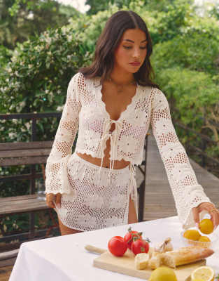 The Frolic The Frolic x Lydia Kara exclusive crochet tie front long sleeve beach crop top co-ord in cream floral-White