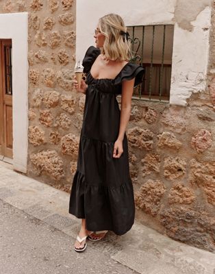The Frolic X Lyds Butler Escora Frill Detail Tie Back Maxi Tiered Beach Dress In Black