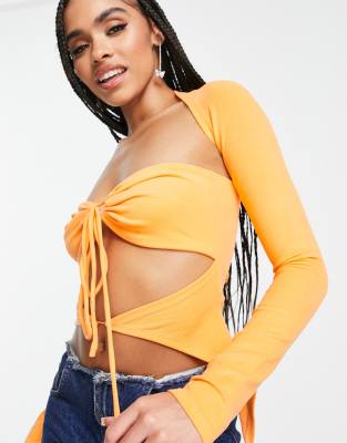 extreme cut out long sleeve crop top in orange