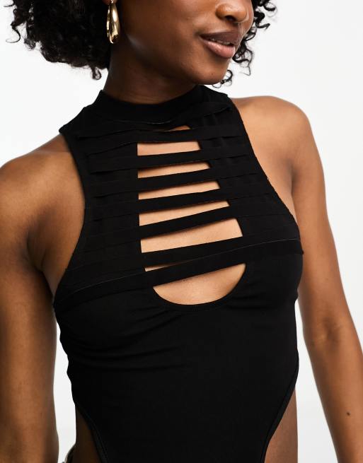 The Kript high neck asymmetric hem cut out crop top