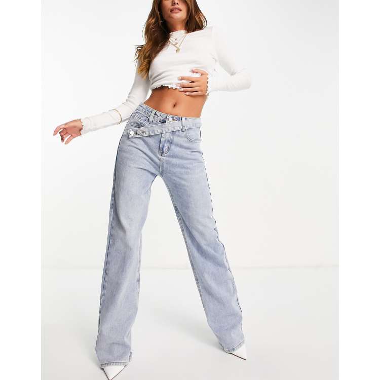 The Kript vintage style mom jeans with distressing and cross over