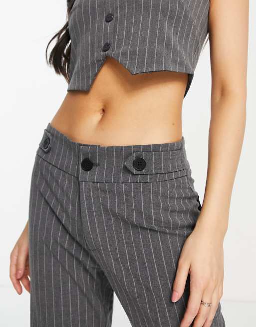 The Kript low rise slim flare 90s trousers in grey pinstripe co