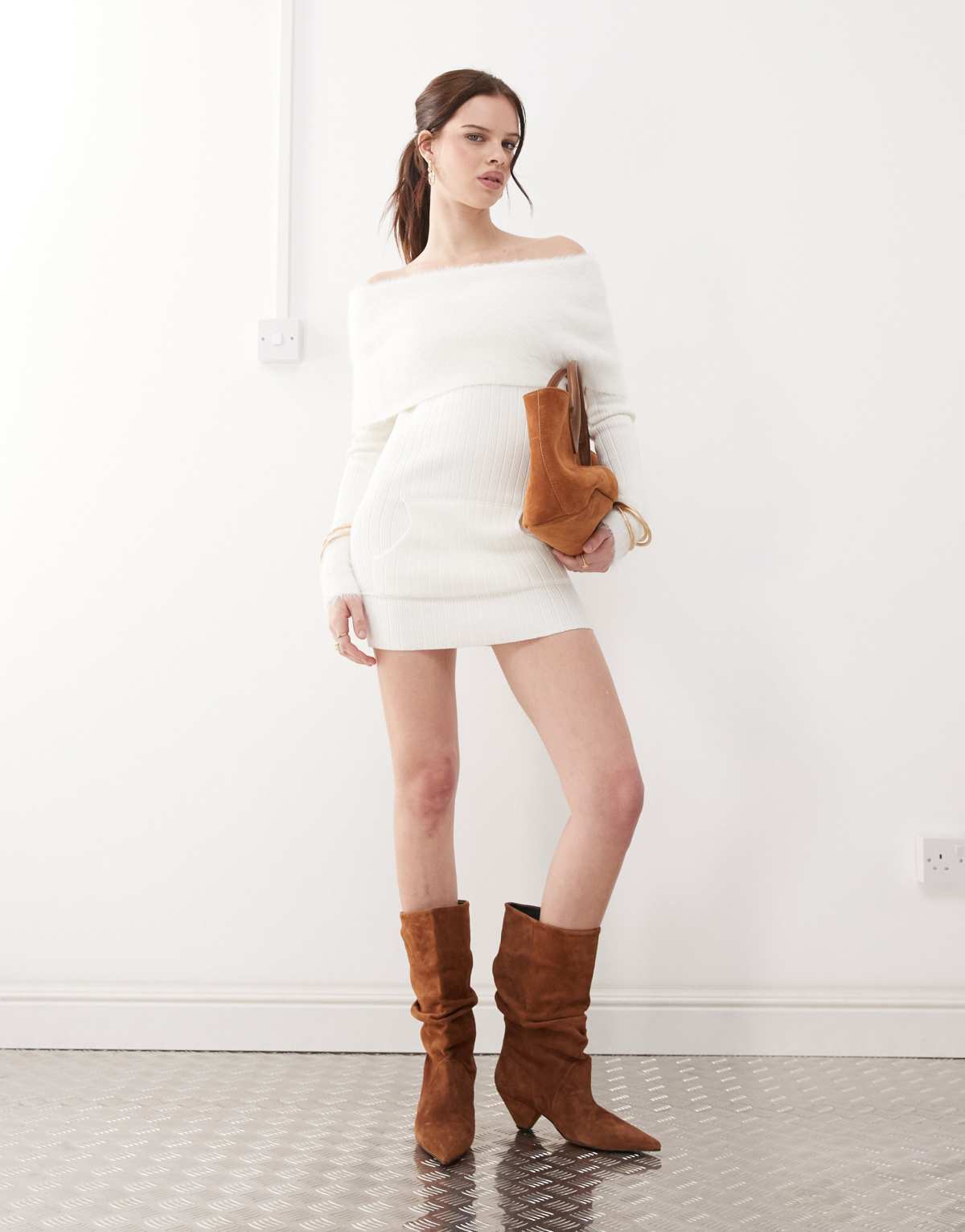 The Kript off shoulder mini dress with faux fur cuffs and fold over in white