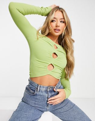 The Kript Y2K long sleeve crop top with cut out detail in avocado