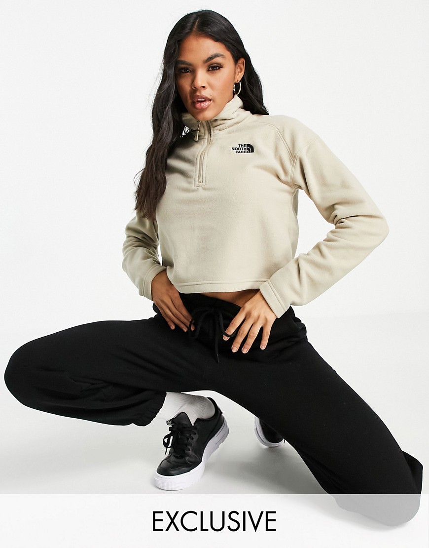 The North Face 100 Glacier 1/4 zip cropped fleece in beige Exclusive at ASOS-Neutral
