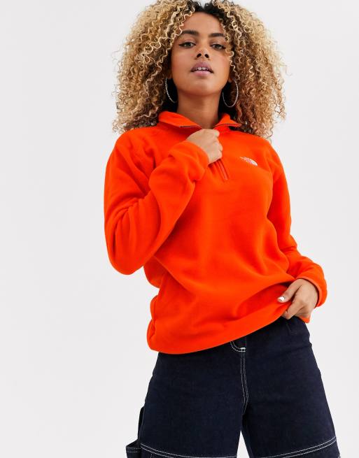 The north face store orange fleece