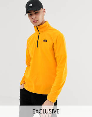 yellow north face jumper