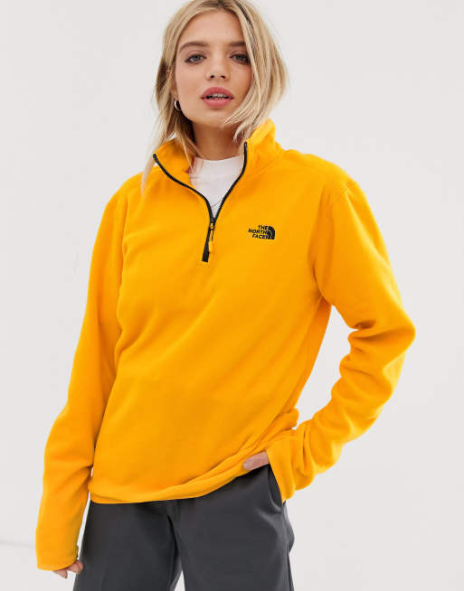 The North Face 100 Glacier 1 4 zip fleece in yellow Exclusive at ASOS ASOS