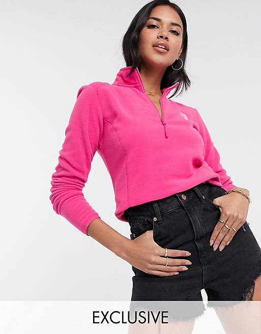 The North Face 100 Glacier cropped 1/4 zip fleece in hot pink Exclusive at ASOS
