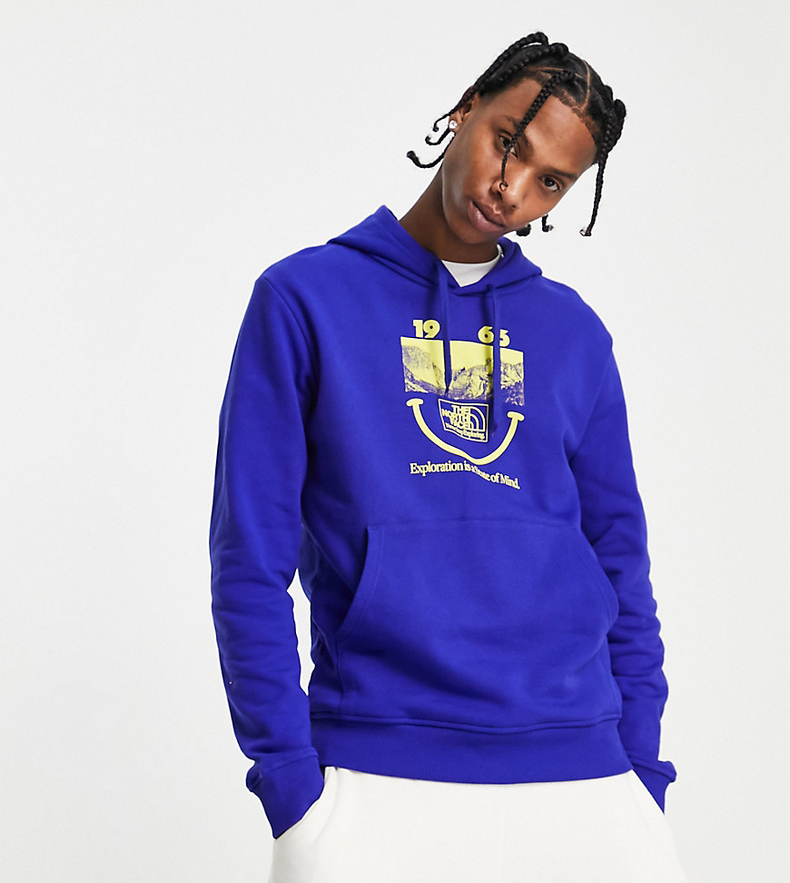 The North Face 1966 Smile Face printed hoodie in dark blue Exclusive at ASOS