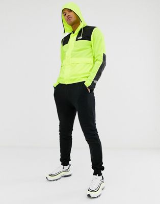 neon yellow north face jacket