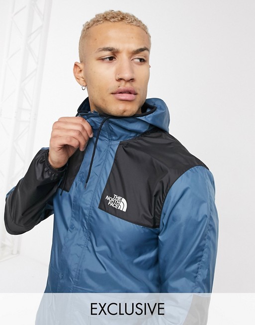 The North Face 1985 Seasonal Mountain jacket in blue Exclusive at ASOS