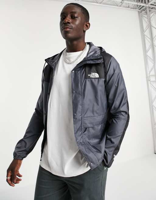 North face store windbreaker grey