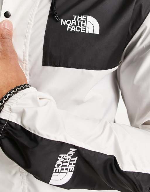 The North Face 1985 Seasonal Mountain Wasserabweisende Jacke in WollweiB und Schwarz