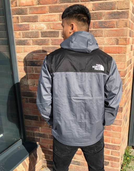 Grey north face best sale windbreaker