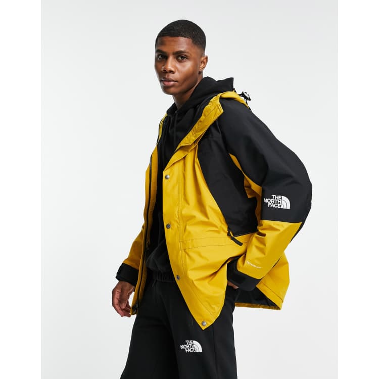 the north face yellow windbreaker