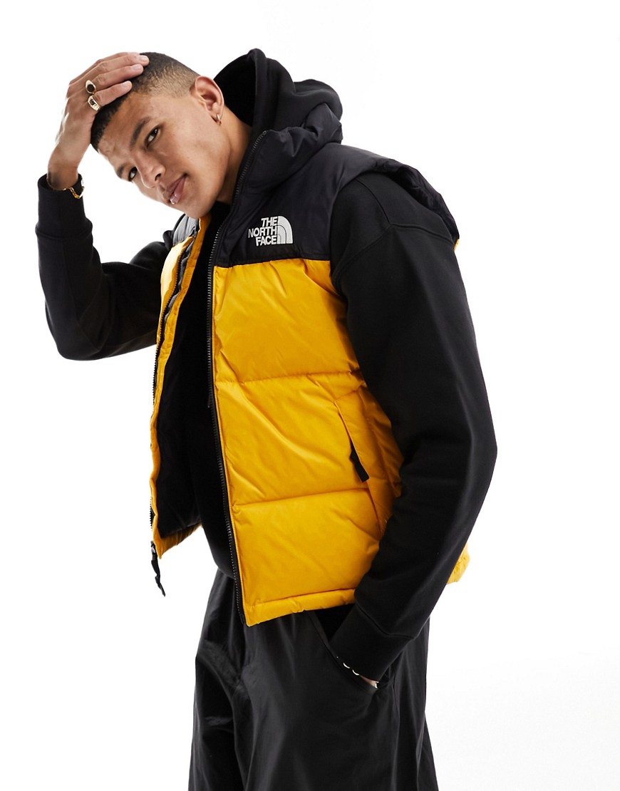 The North Face 1996 Nuptse Down Puffer Vest In Black And Yellow