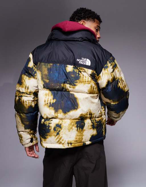 The North Face 1996 Retro Nuptse down puffer jacket in bleach dye print and black ASOS
