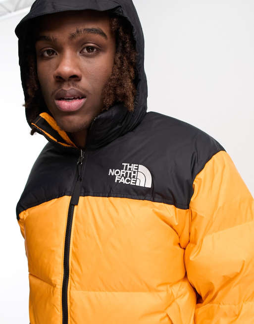 North face orange shop and black jacket