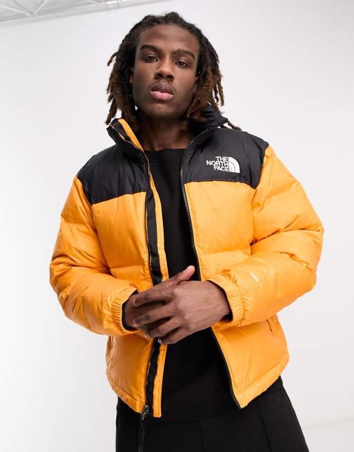 The North Face 1996 Retro Nuptse down puffer jacket in orange | ASOS