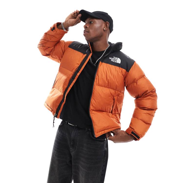 Orange north face bubble jacket best sale