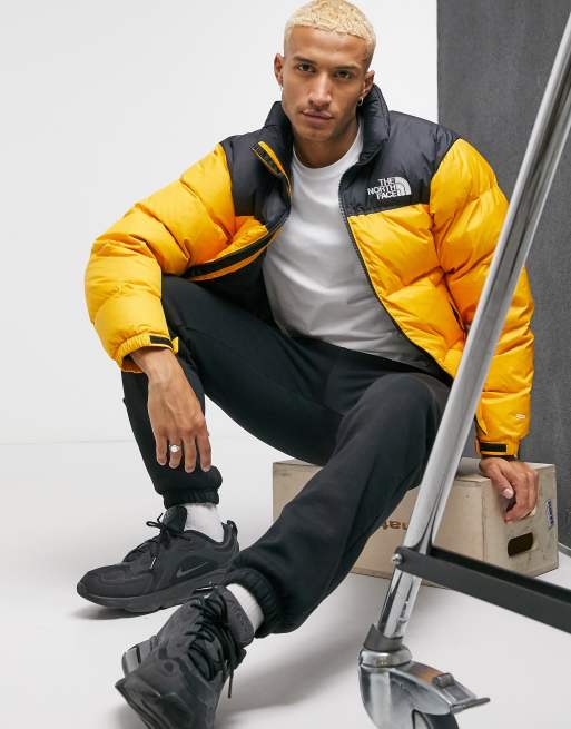 The North Face 1996 Retro Nuptse jacket in yellow