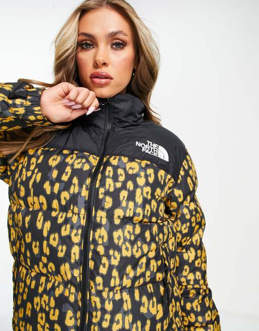 The North Face 1996 Retro Nuptse leopard print jacket in black yellow