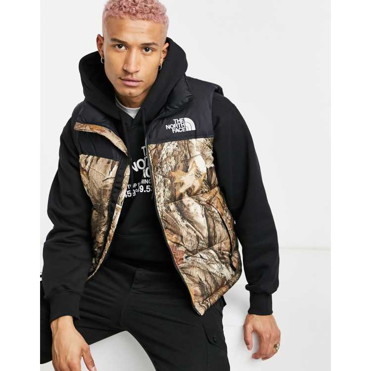 North face on sale camo gilet