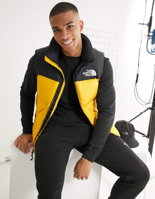 The North Face 1996 Retro Nuptse vest in yellow