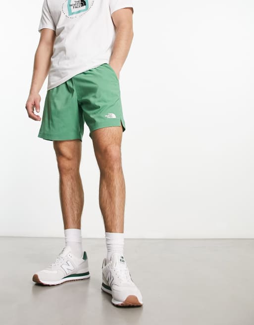 Green north face store shorts