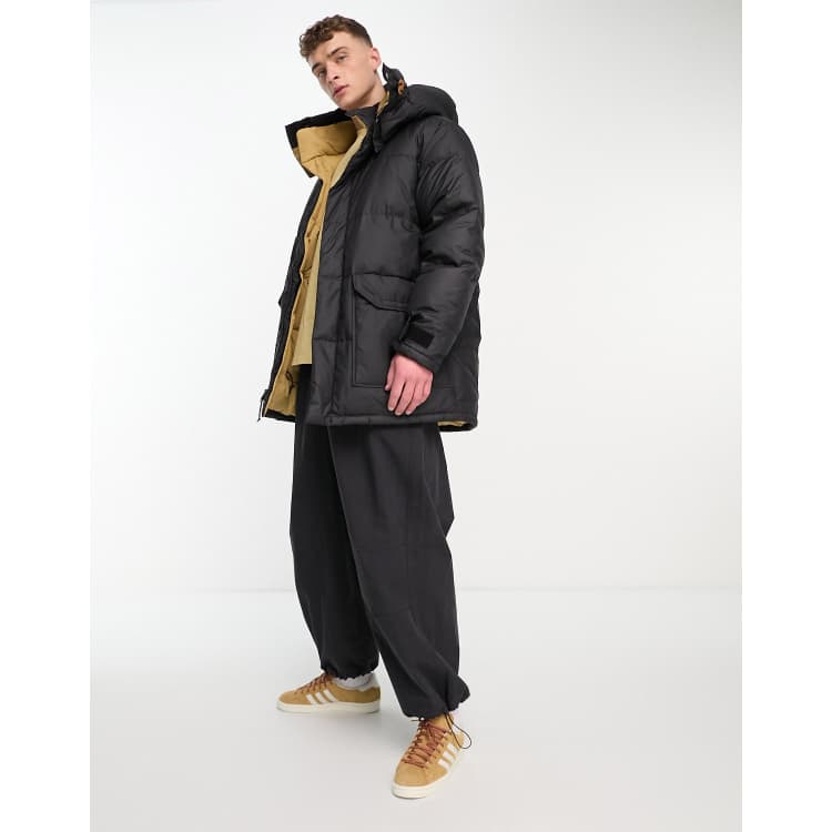 The North Face 77 Brooks Range down hooded parka in black | ASOS