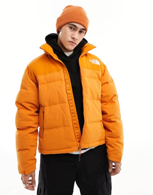 Orange north face puffer on sale jacket