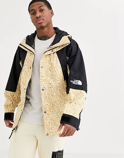 The North Face 94 Retro Mountain Light jacket in white sherpa print