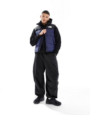 The North Face '96 Retro Nuptse down puffer gilet in navy and black - ASOS Price Checker