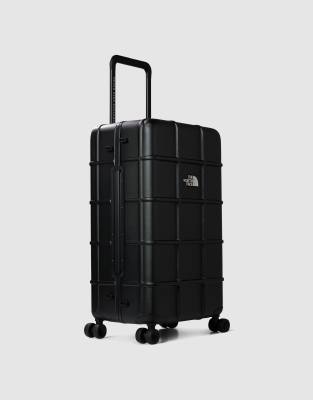 The North Face All weather 4-wheeler suitcase 30" in black and white