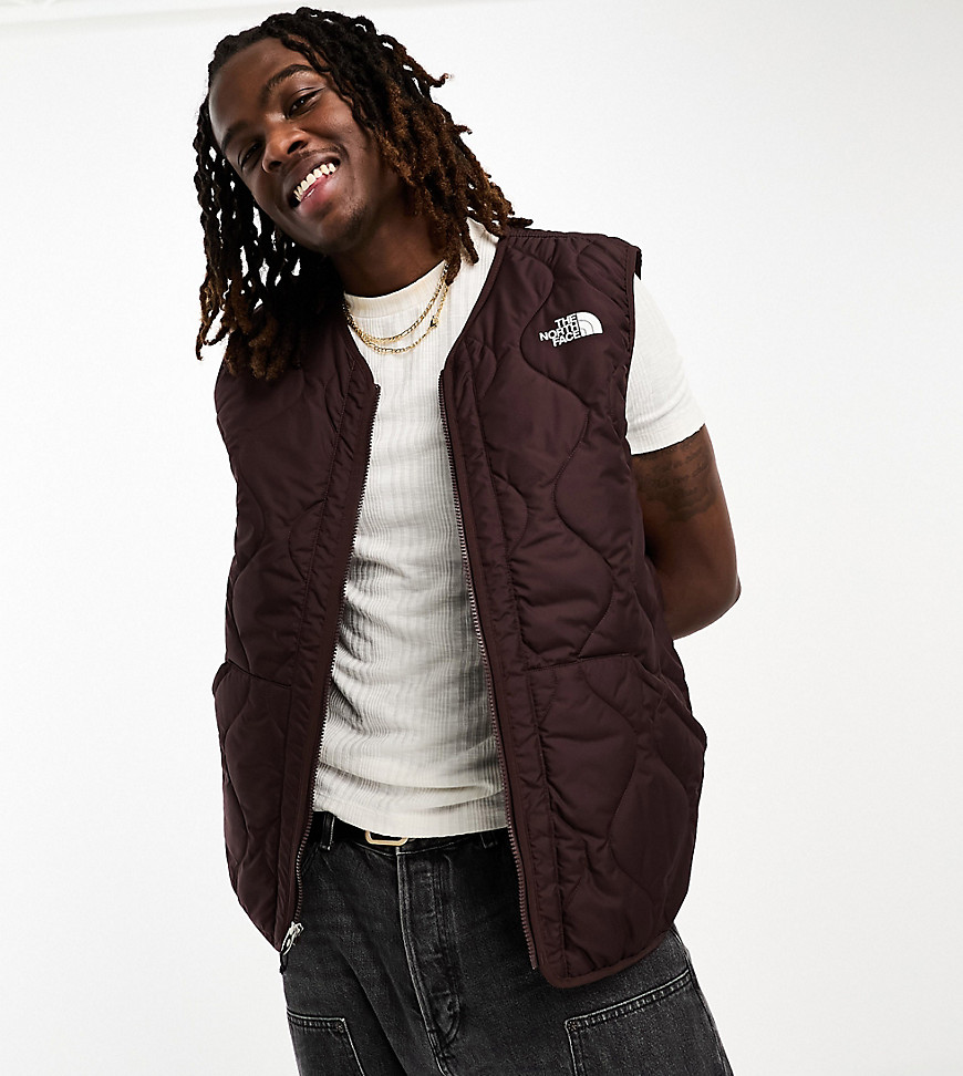 The North Face Ampato quilted zip up liner vest in brown Exclusive at ASOS