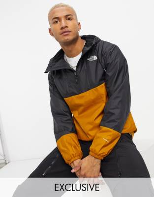 brown and black north face jacket