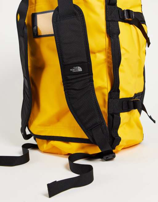 The North Face Base Camp 50l medium duffel bag in yellow and black