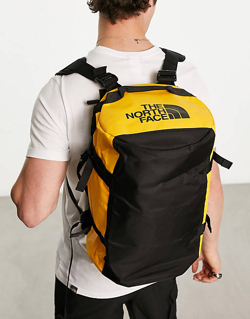 The North Face Base Camp extra small 31l duffel bag in yellow and