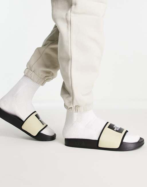 The North Face Base Camp III sliders in beige | ASOS