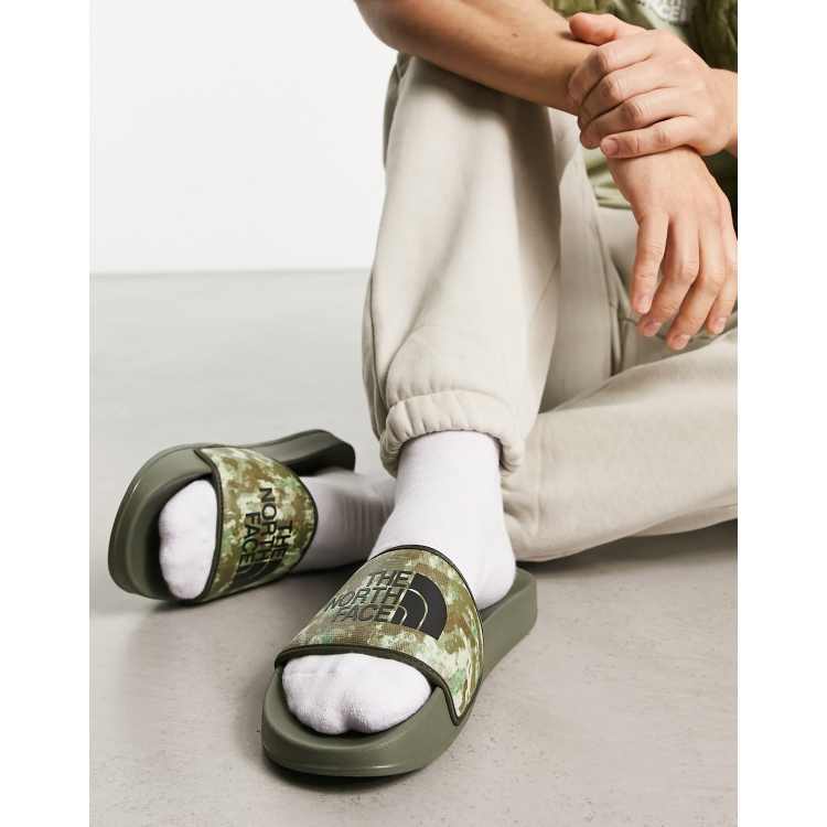The North Face Base Camp III sliders in camo | ASOS