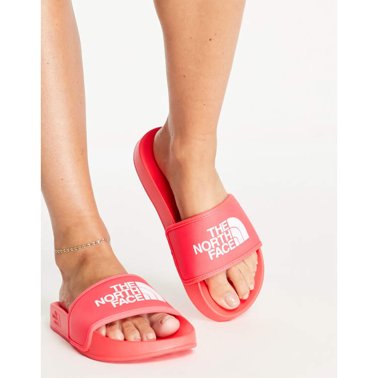 The North Face Base Camp III sliders in coral