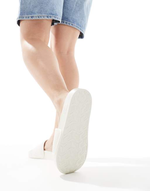 The North Face Base Camp III sliders in white | ASOS