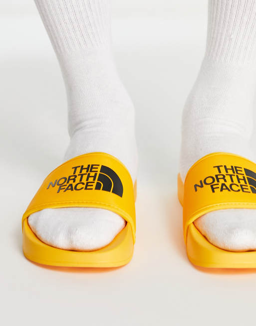 The North Face Base Camp III sliders in yellow