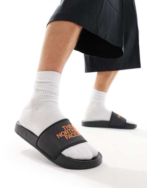 The North Face Base Camp III slides in grey and orange