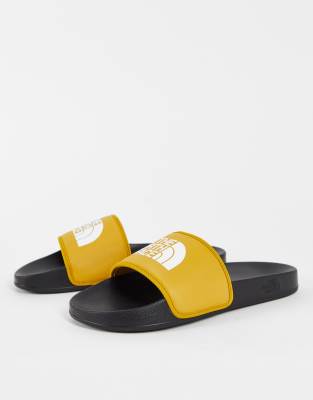 yellow north face slides