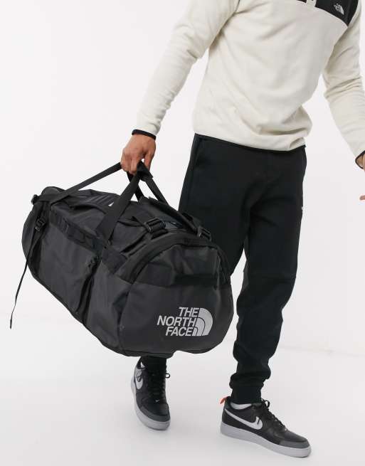 The North Face Base Camp large 95L duffel bag in black ASOS