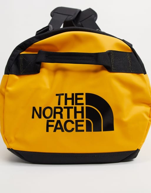 north face yellow duffle bag