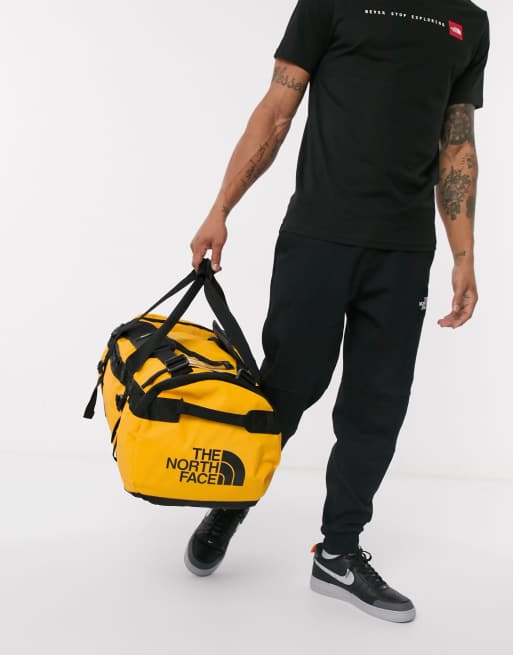 The North Face Base Camp Medium Duffel Bag 75l In Yellow Asos