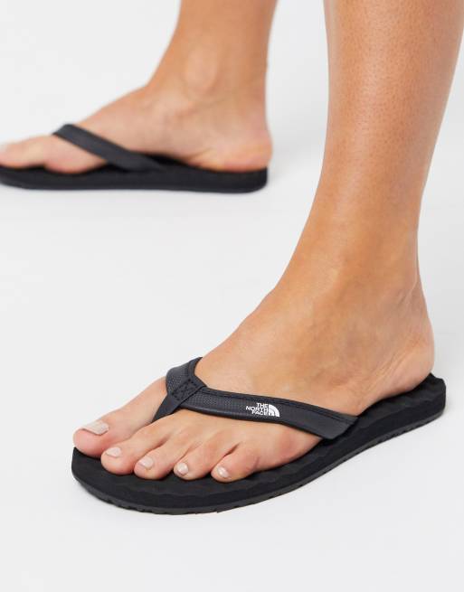 black north face flip flops